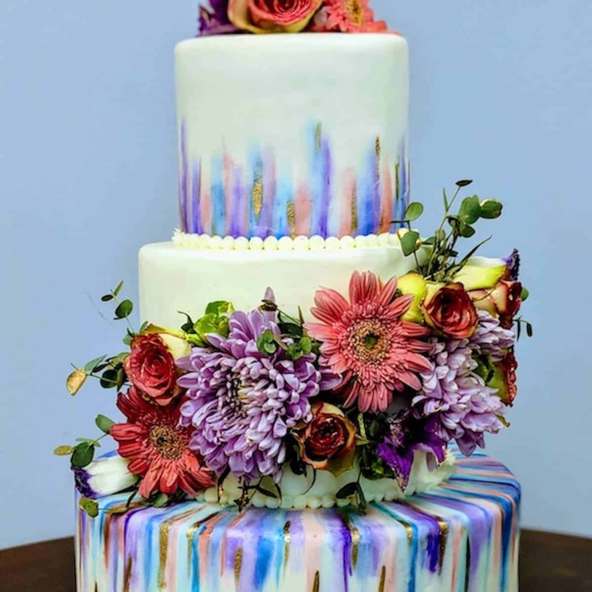 Wedding cake decorated with flowers.