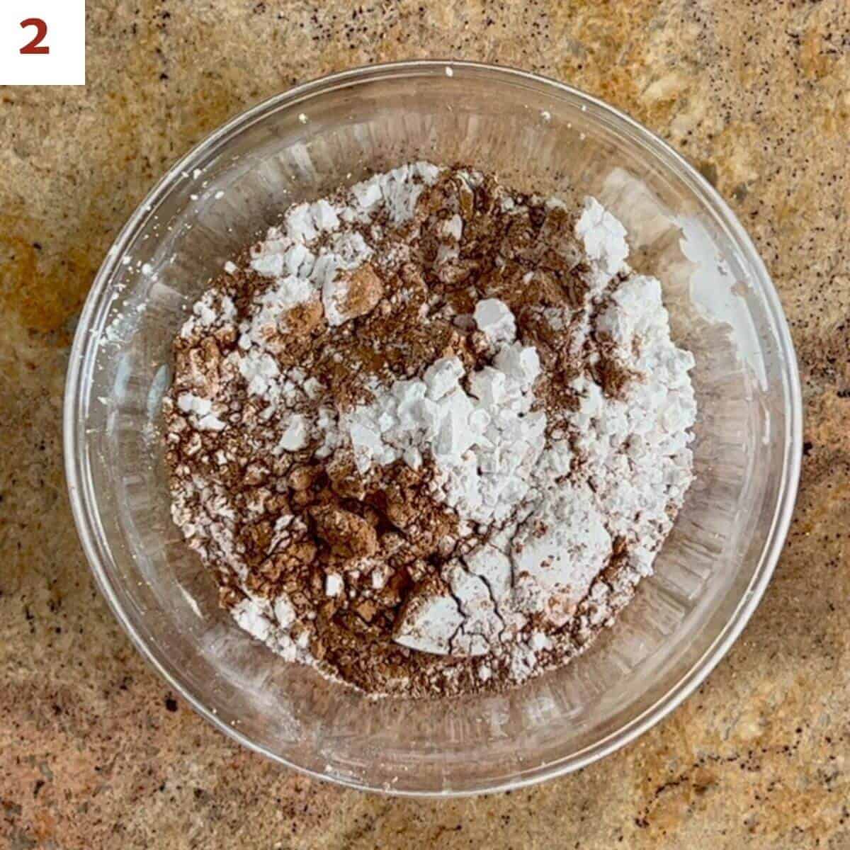 powdered sugar & cocoa powder in a glass bowl.