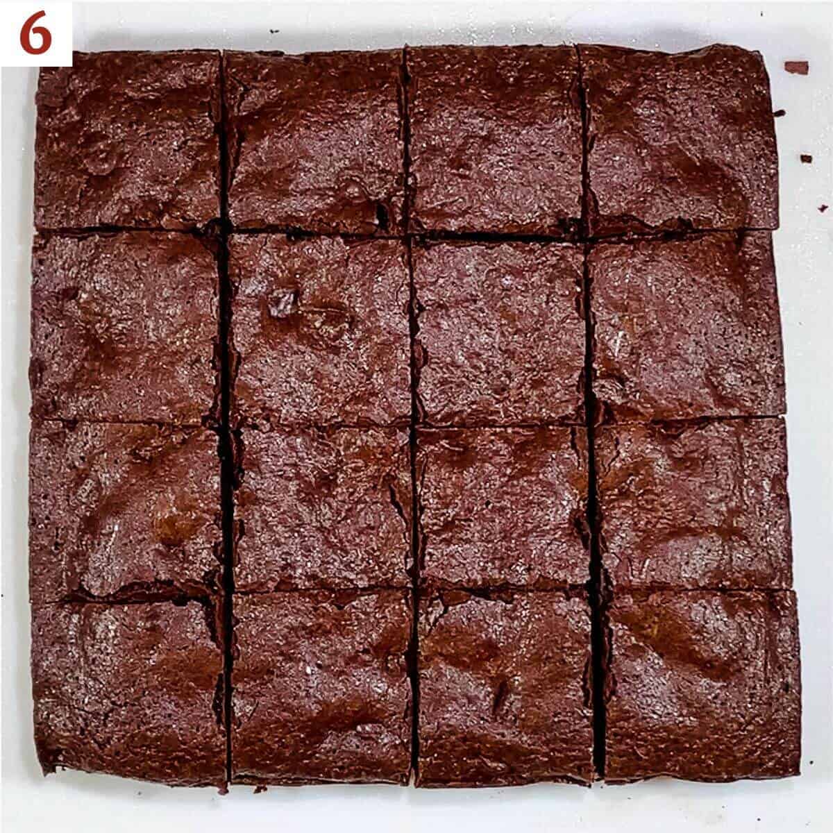 Sliced brownies on a cutting board.