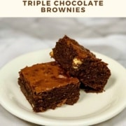 Two Triple Chocolate Brownies stacked on a white plate Pinterest banner.