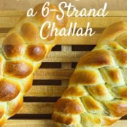 Six strand straight and flat challahs on a cutting board Pinterest banner.
