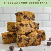 Chocolate Chip Cookie Bars stacked on a counter Pinterest banner.