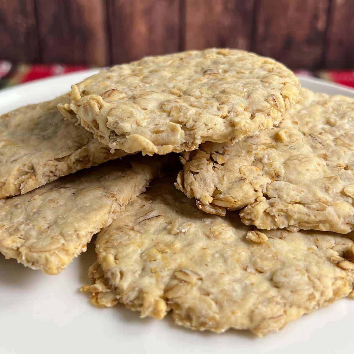 Bannocks stacked on a white plate.