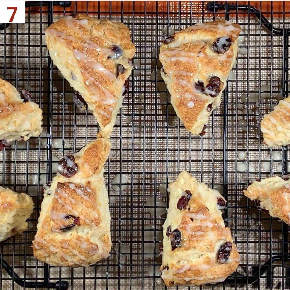 Glazed scones on a cooling rack.