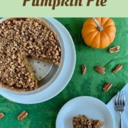 Praline Pumpkin Pie in pie pan with a slice on a white plate next to pumpkin & scattered pecans from overhead Pinterest banner.