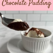 Bite of pudding on a spoon in front of a ramekin of pudding on round white plate with spoon Pinterest banner.