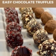 Easy Dark Chocolate Truffles plated closeup with bite Pinterest banner.