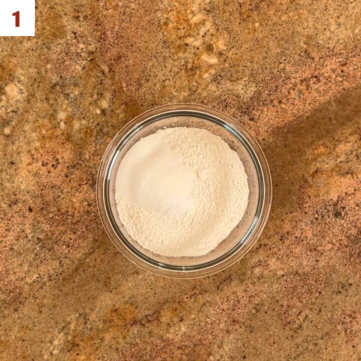 Glass bowl with flour, sugar, and salt.