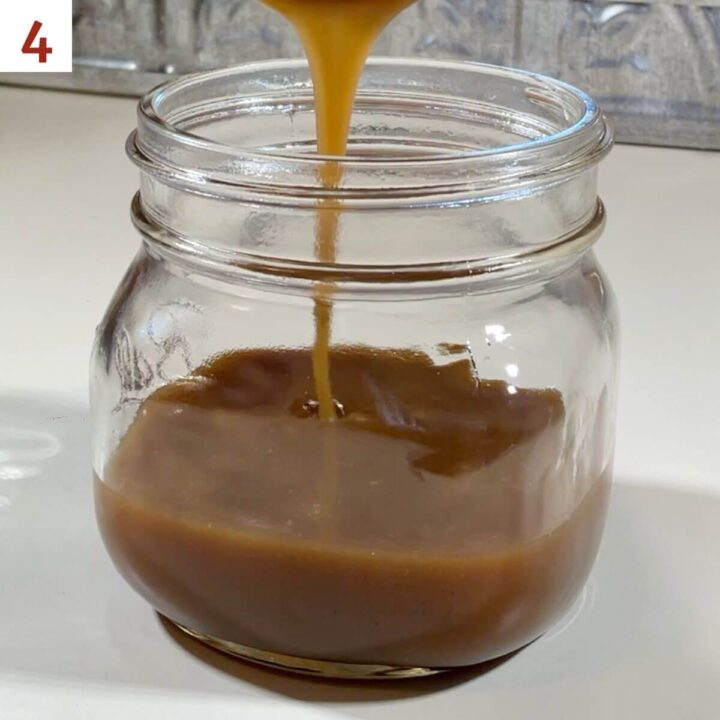Pouring Butterscotch Sauce into a glass jar.
