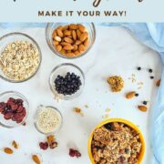 Granola in a bowl next to ingredients portioned into glass bowls from overhead Pinterest banner.
