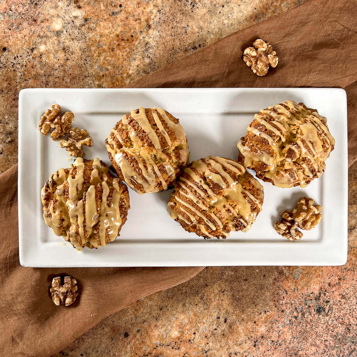 Maple Walnut Scones on a white tray from overhead.