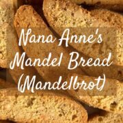 Close up of finished mandel bread on a plate Pinterest banner.