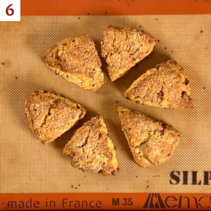 Baked scones on a baking pan.