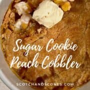 Peach Cobbler in a baking pan with a scoop of vanilla ice cream Pinterest banner.
