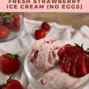 A bowl of strawberry ice cream with strawberries in a glass bowl Pinterest banner.