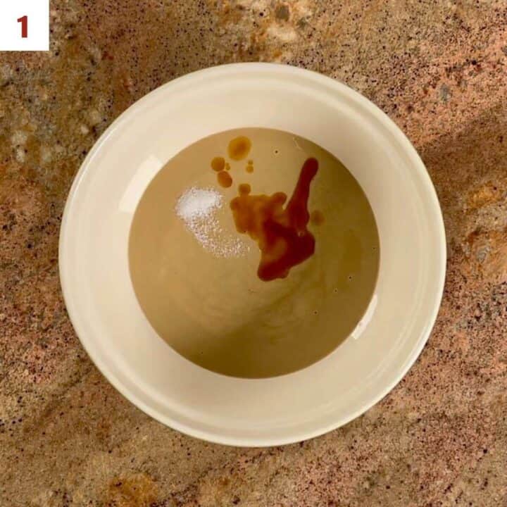 Mixing tahini paste, vanilla, and salt in a bowl.