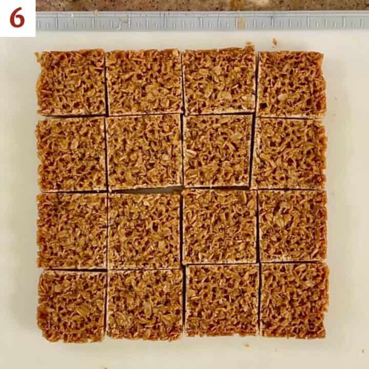 British flapjacks cut into squares on a cutting board.