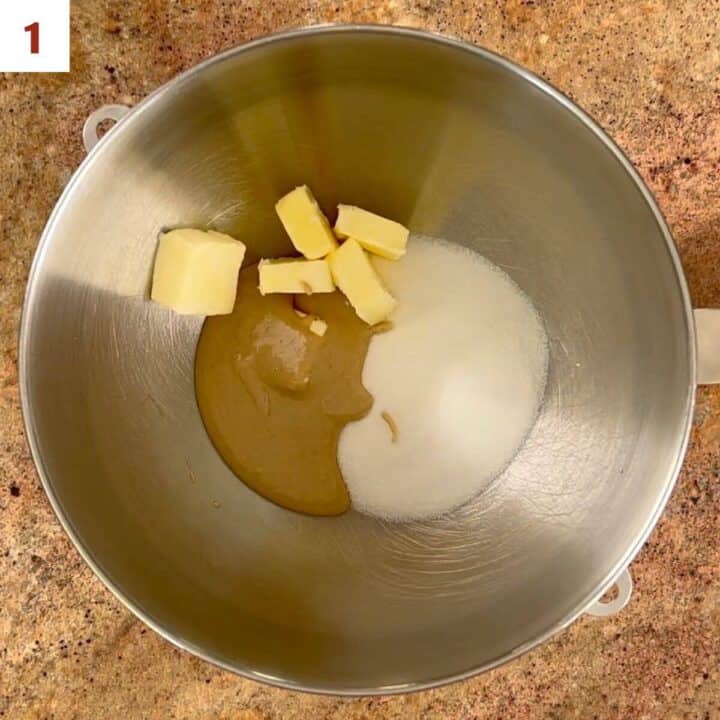 Mixing the butter, sugar, and tahini paste in a metal mixing bowl.