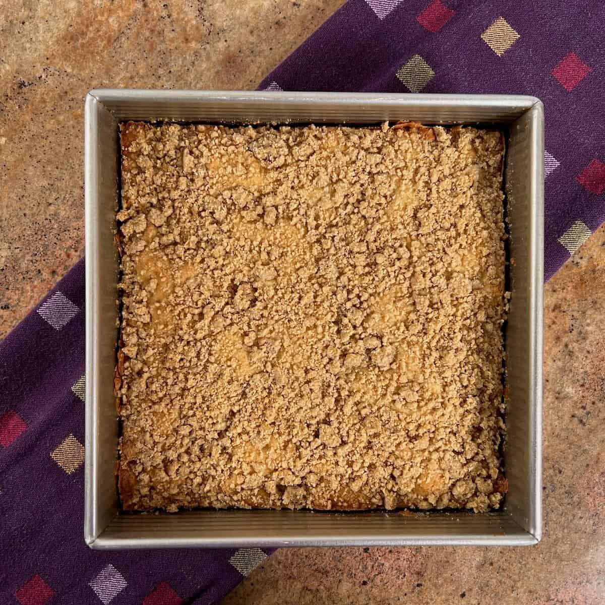 Whole Sourdough Discard Tahini Coffee Cake in the baking pan from overhead.
